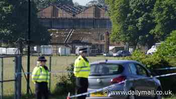 Three dead in Bicester fire: Two firefighters and one member of the public killed after multiple explosions heard as blaze rips through former RAF base