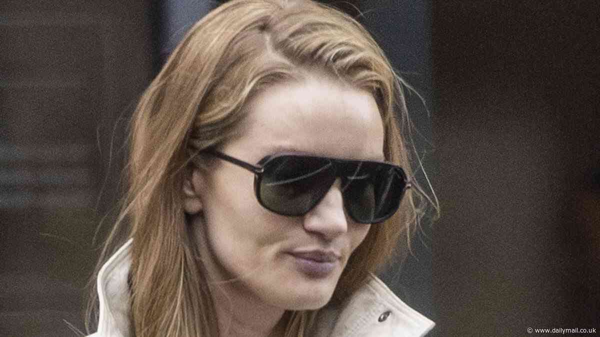 Rosie Huntington-Whiteley makes a rare make-up free appearance as she steps out after hitting the gym