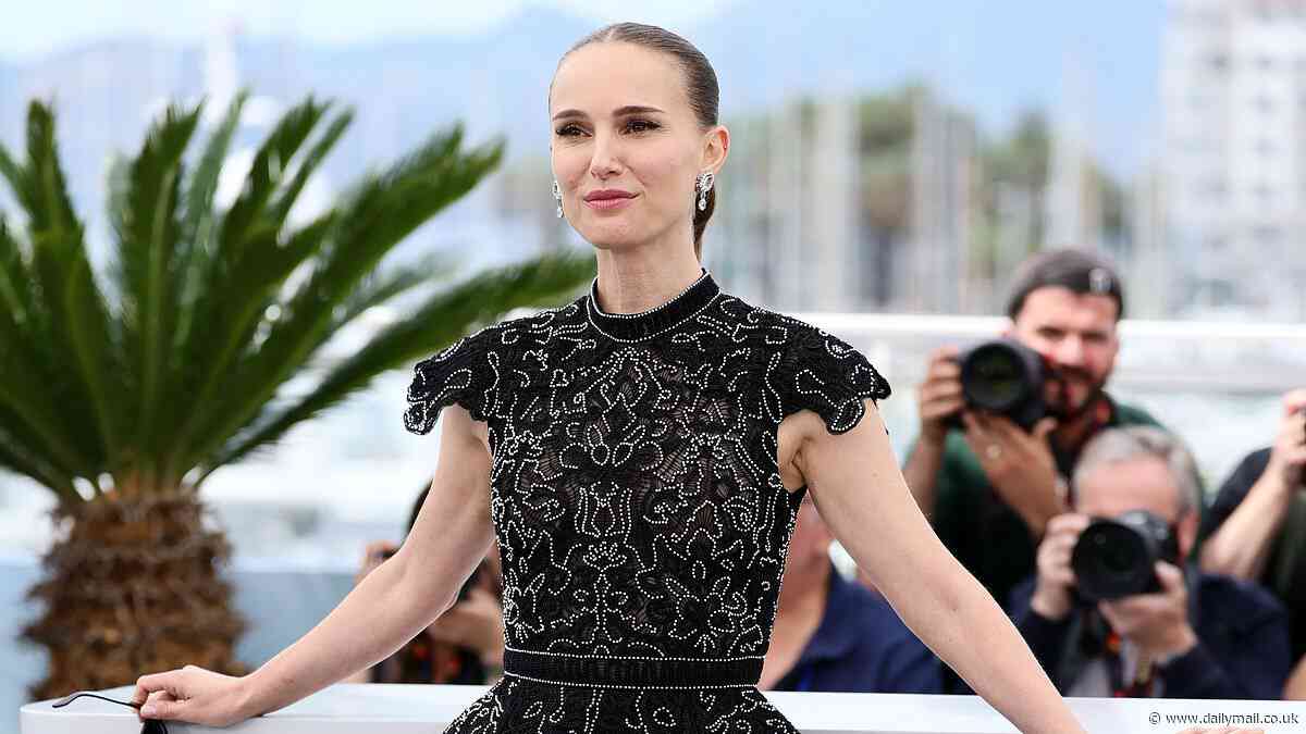 Natalie Portman puts on a VERY leggy display in a black embroidered mini dress as she poses at the Arco photocall during Cannes Film Festival