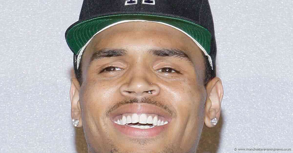 Chris Brown held in custody for alleged nightclub attack after Manchester court appearance