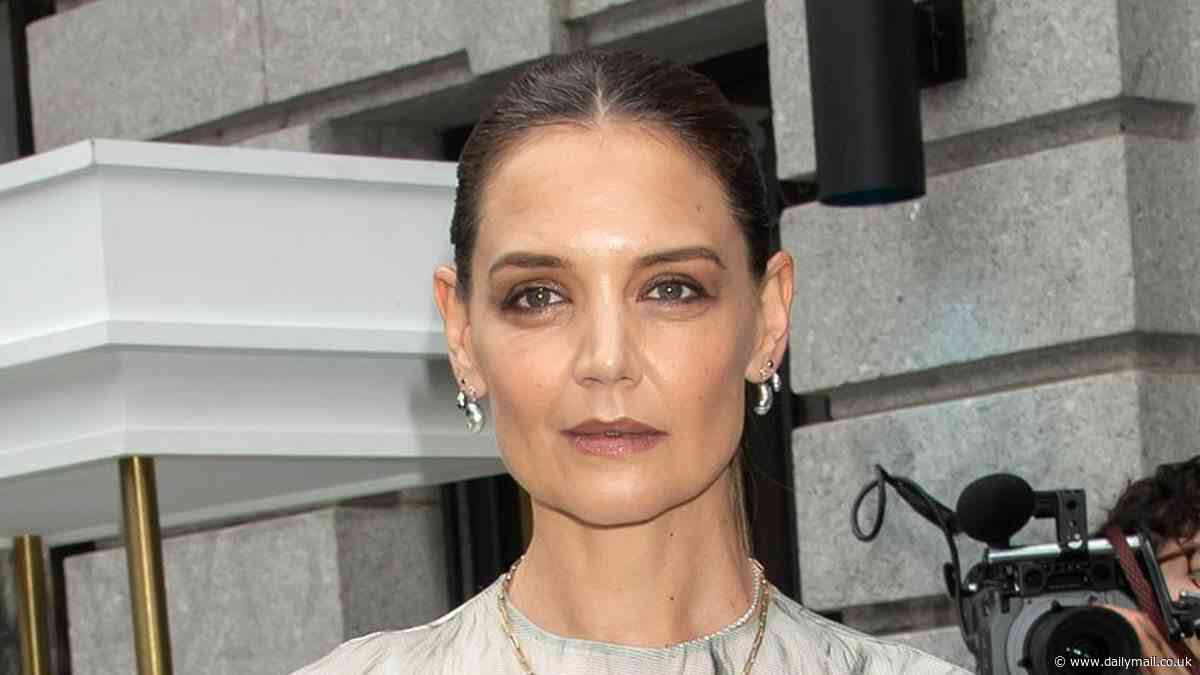 Katie Holmes cuts a trendy figure in a semi-sheer monochrome blouse as she attends Dr. Barbara Sturm's NYC pop-up launch amid ex Tom Cruise's new romance with Ana de Armas