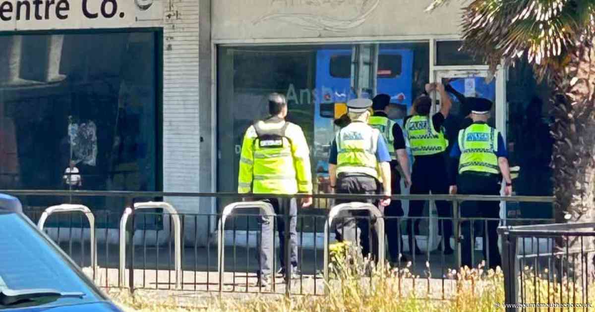 Boy 'falls through building' in town centre