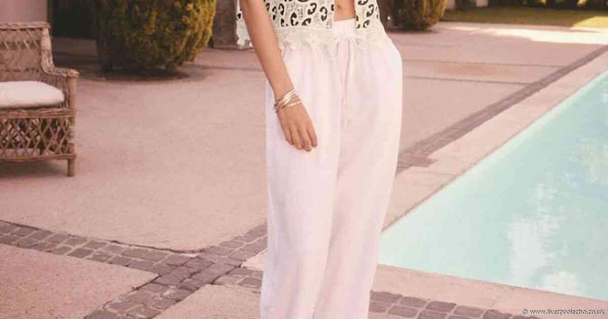 Next's £26 linen barrel trousers are 'comfy and cool in hot weather' and are bang on trend