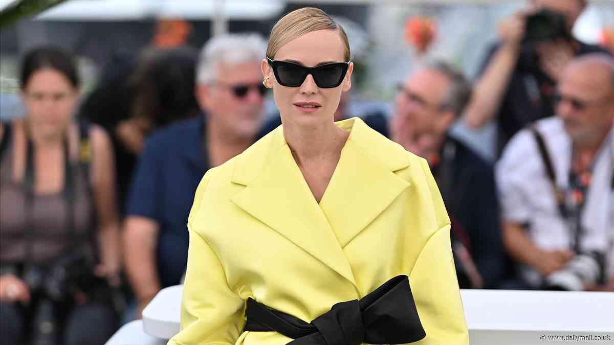 Diane Kruger puts on a leggy display in a yellow kimono dress at Cannes Film Festival's Amrum photocall