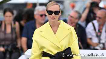 Diane Kruger puts on a leggy display in a yellow kimono dress at Cannes Film Festival's Amrum photocall