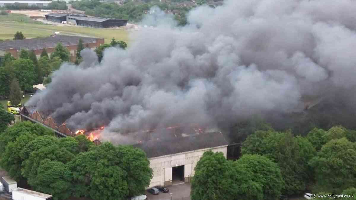 Police launch investigation led by major crime team into Bicester heritage car centre blaze after 'unexplained' death of two firefighters and one member of the public