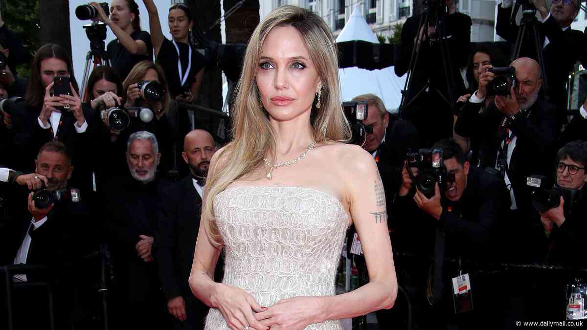 Angelina Jolie exudes glamour in an elegant cream gown as she joins Natalie Portman, Julia Garner and Emma Stone at the Eddington premiere during Cannes Film Festival
