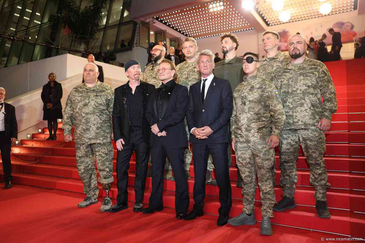 78e Festival de Cannes: Sean Penn s'invite à la montée des marches du documentaire sur Bono de U2... en compagnie de soldats ukrainiens