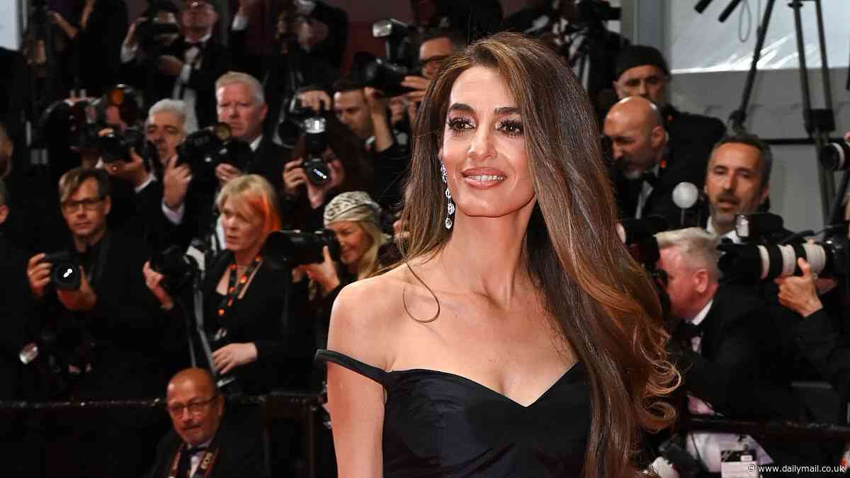 Amal Clooney exudes old Hollywood glamour in black gown as she joins Kristen Stewart and Helena Christensen at star-studded premiere of Bono: Stories Of Surrender at the Cannes Film Festival