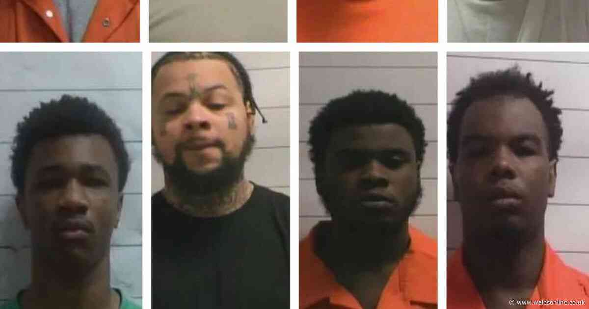 Eleven prisoners escape through hole in the wall and leave taunts to guards