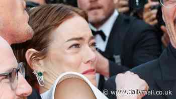 Emma Stone appears to have epic red carpet meltdown as Hollywood heartthrob comes to her rescue