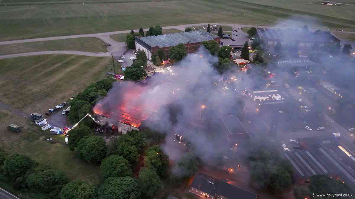 Inferno at former RAF base kills two firefighters in service's worst day for 15 years