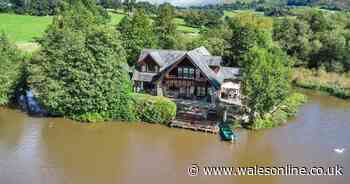 Incredible home sits on lake with private islands you can row to