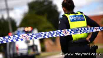 Cops descend on a suburban home after woman, 23, is found dead