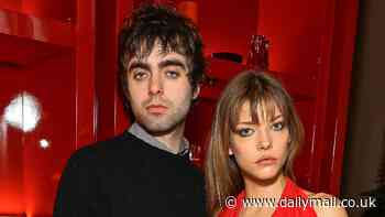 Lennon Gallagher's girlfriend Isobel Richmond wows in a plunging red dress as couple cosy up at The Standard