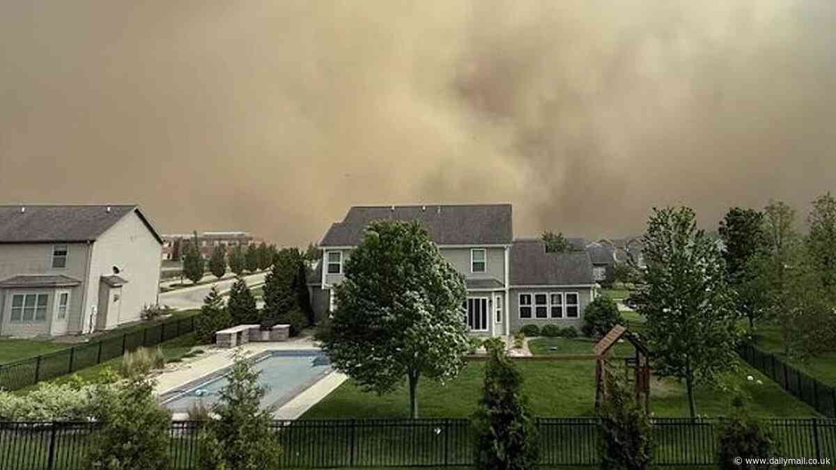 Dust storm warning for Chicago as apocalyptic skies shroud the windy city and visibility falls to zero