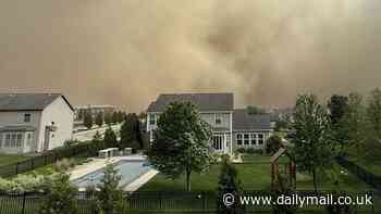 Dust storm warning for Chicago as apocalyptic skies shroud the windy city and visibility falls to zero