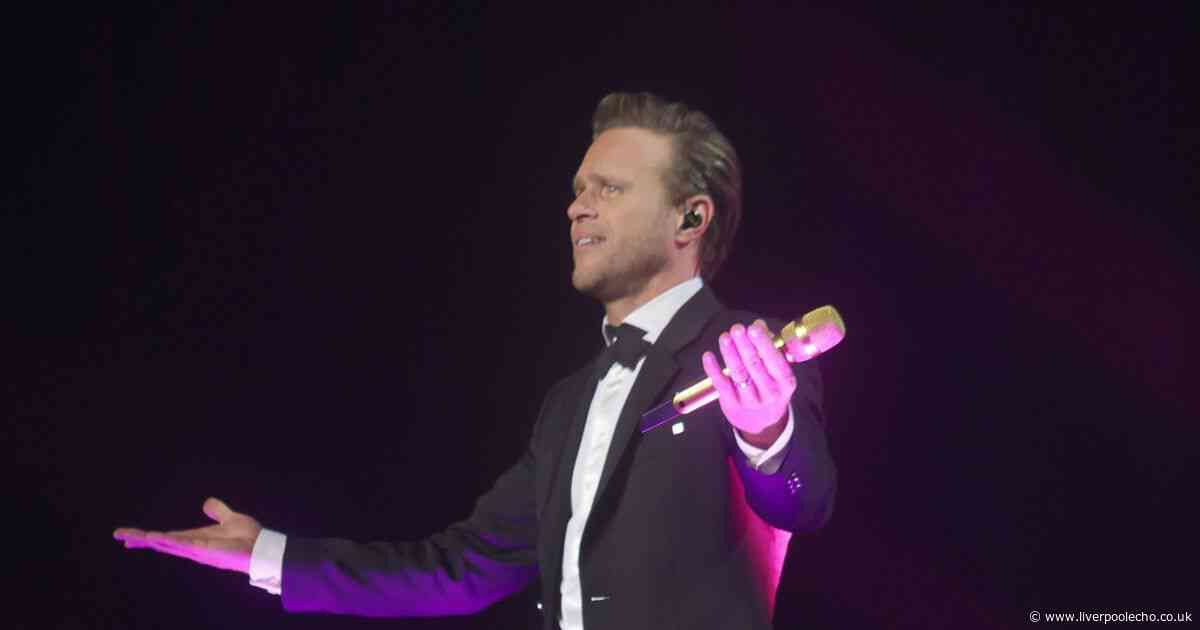 Olly Murs says 'shall I go' as he's booed by Liverpool crowd after on stage admission