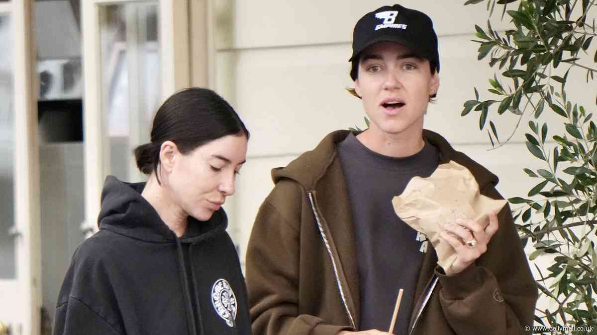 The Veronicas star Jessica Origliasso and her fiancée Alex Smith are the picture of domestic bliss in Brisbane