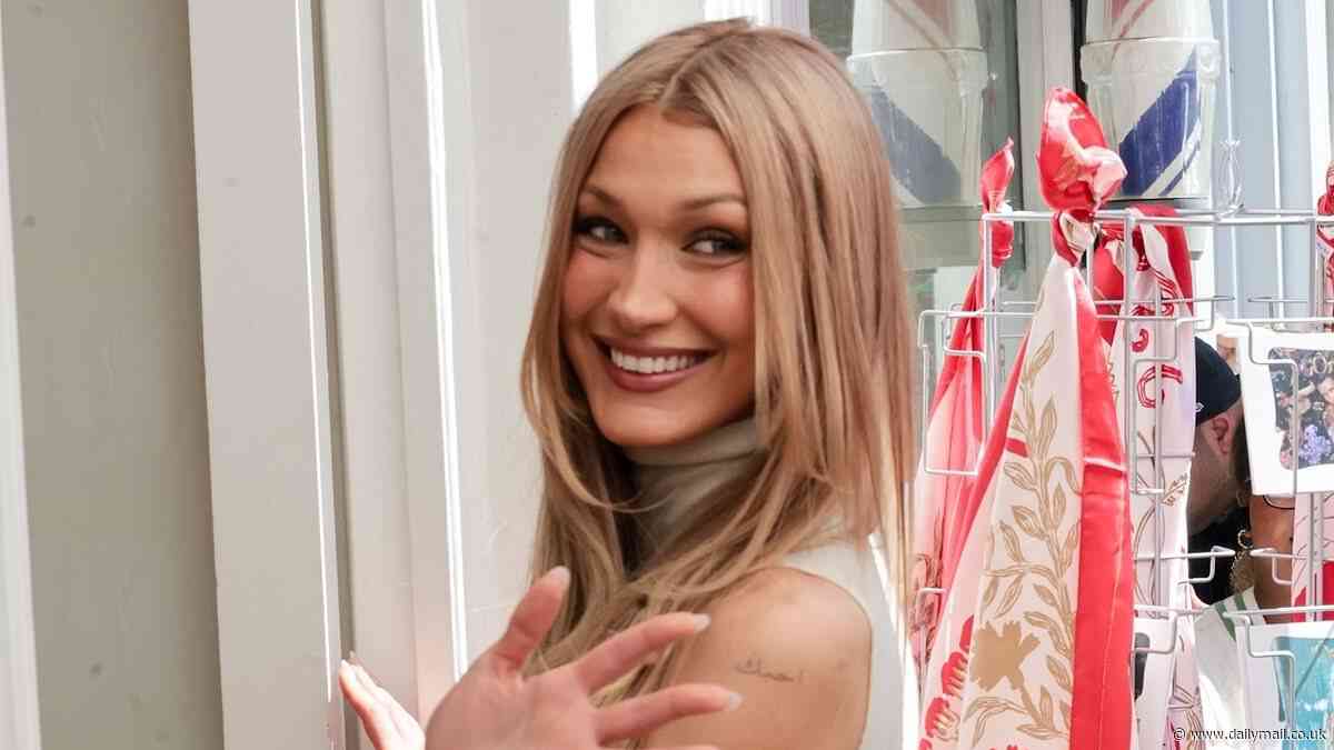 Bella Hadid looks effortlessly stylish in a VERY short skirt and crop top as she steps out in London
