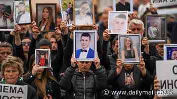 Heartbroken families of the 62 victims burnt to death in horror inferno at North Macedonia nightclub demand justice - as 5,000 take to the streets with photos of loved ones lost in blaze