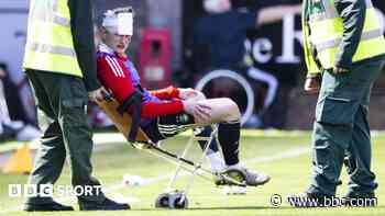 MacKenzie left bloodied by seat thrown by own fans