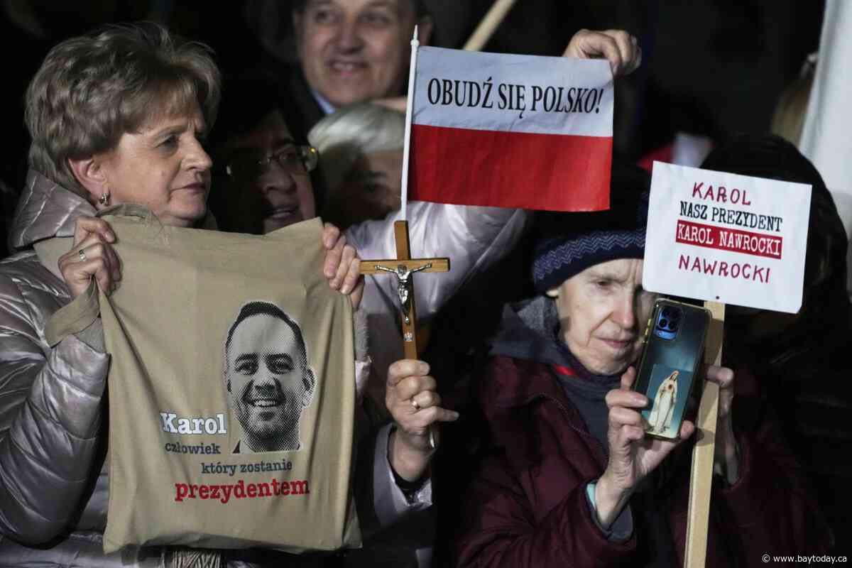 Poles vote for a new president as security concerns loom large