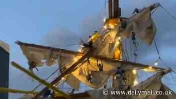 Sailors hang suspended in the air on Mexican navy vessel's mast after ship smashed into Brooklyn Bridge