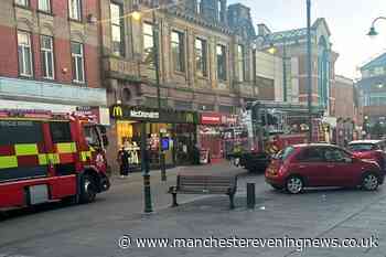 Alert at Greater Manchester Primark after man climbs onto roof