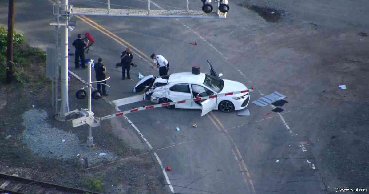 Car hit by train in Durham, driver survives with minor injuries