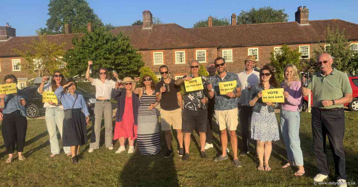 Residents raise a glass to celebrate suspension of bus scheme