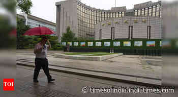 China's central bank cut interest rates to record lows to revive grappling economy