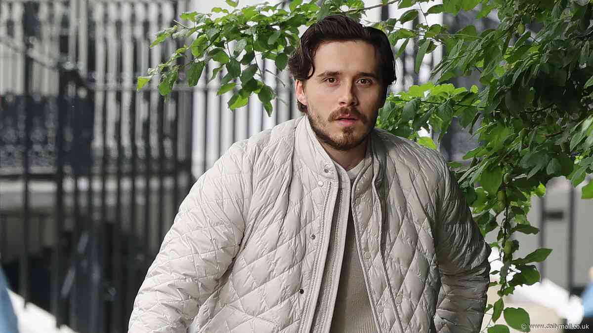Brooklyn Beckham is back in London on a photoshoot for Moncler - minutes away from both the family home and David's appearance at the Chelsea flower show amid 'feud'