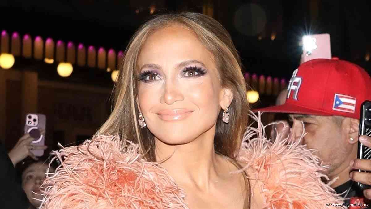 Braless Jennifer Lopez, 55, suffers a nip slip in a plunging peach dress before swiftly changing into a high neck white gown at benefit concert