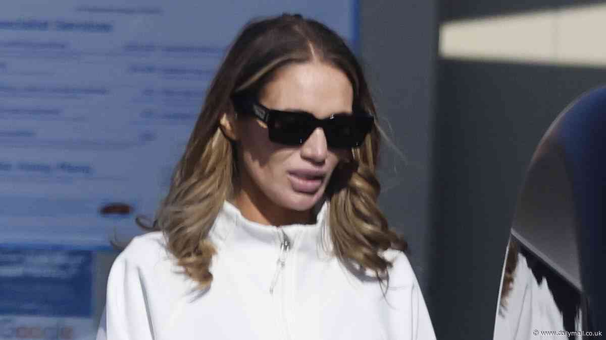 Amy Childs shows off her slimmed down frame as she keeps it casual in comfy shorts after sparking weight loss concerns with fans