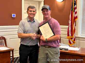 Photo: City passes resolution honoring long time employee