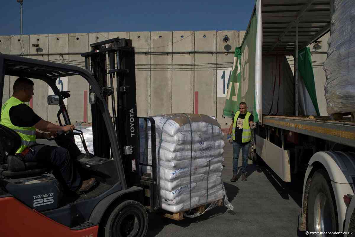 90 truckloads of aid picked up in Gaza after delays at crossing with Israel