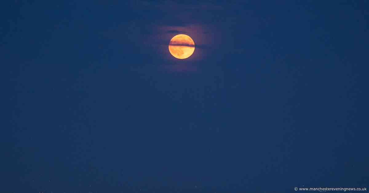 Stunning image shows 'strawberry moon' phenomenon in sky over Greater Manchester