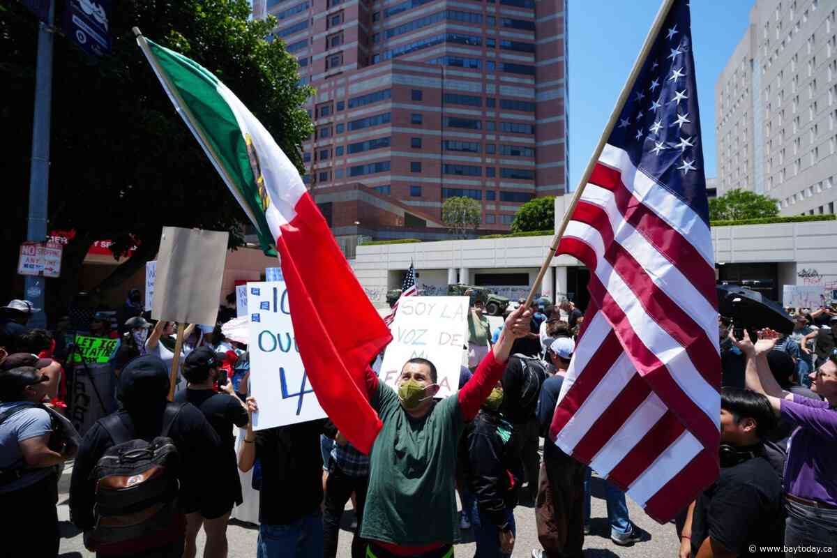 LA police swiftly enforce downtown curfew as protests against Trump's immigration crackdown continue