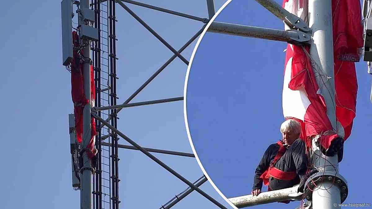 Zien: parachutespringer zit vast op 50 meters hoogte in Oss