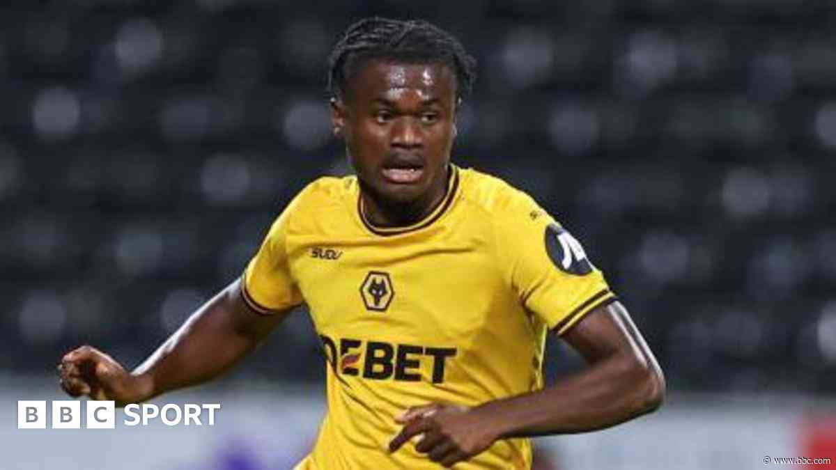 Swindon sign defender Mabete from Wolves