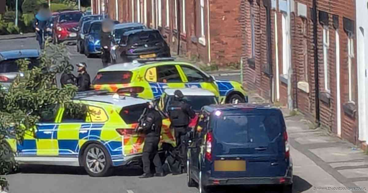 Armed police sent to residential street as 'scared' neighbours watch on