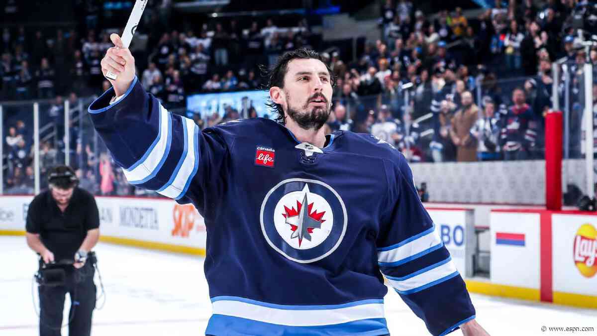 Jets' Hellebuyck pulls off rare Hart-Vezina double