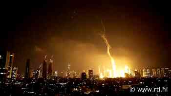 Harde knallen, oranje lucht: raketten uit Iran raken Tel Aviv
