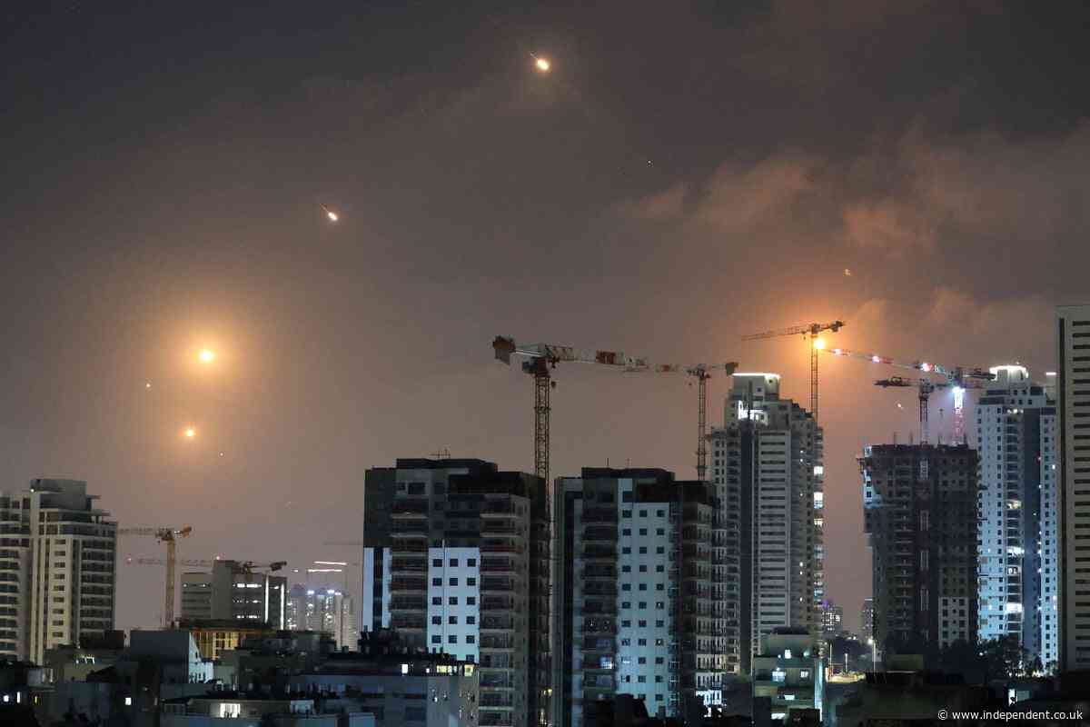 Israel-Iran latest: Iran launches ballistic missiles at Tel Aviv as defence minister vows Tehran will pay ‘heavy price’