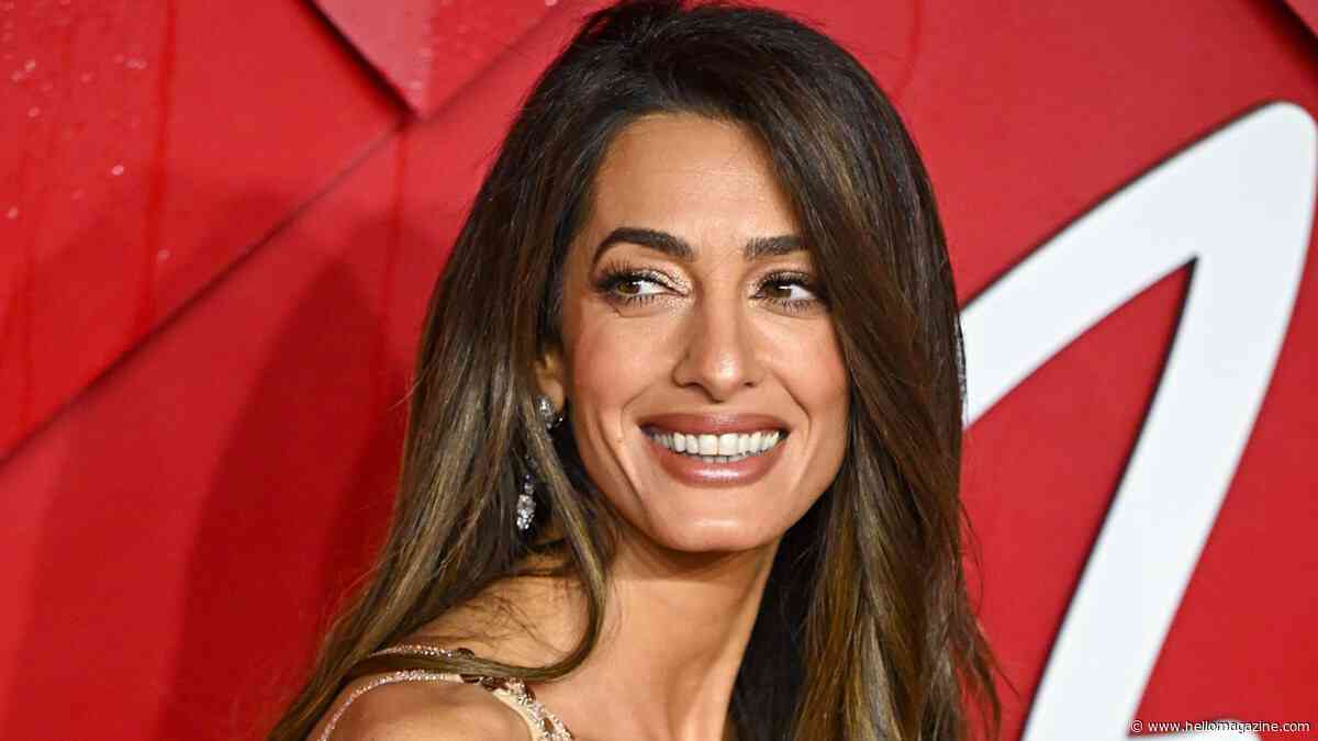 Amal Clooney puts a twist on structured skirt suit with barrister's wig for major honor