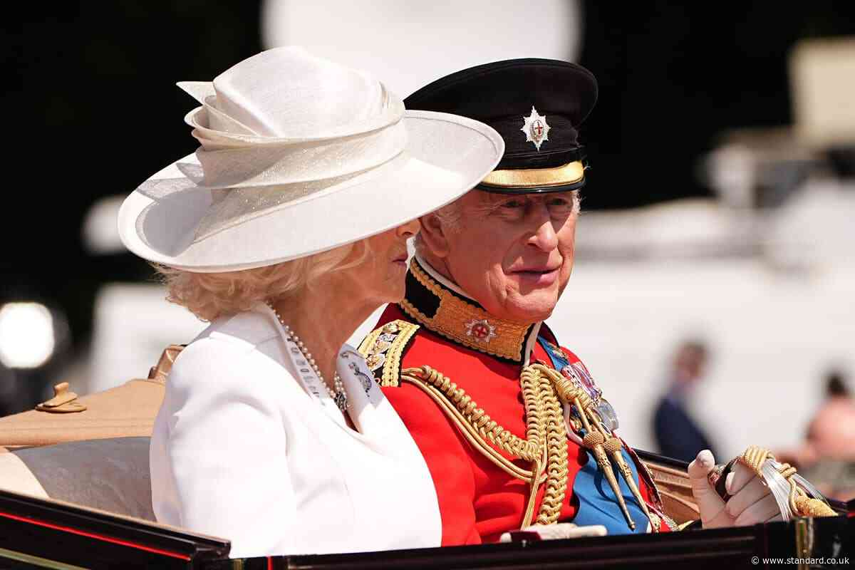 King wears black armband in memory of India air disaster at Trooping the Colour