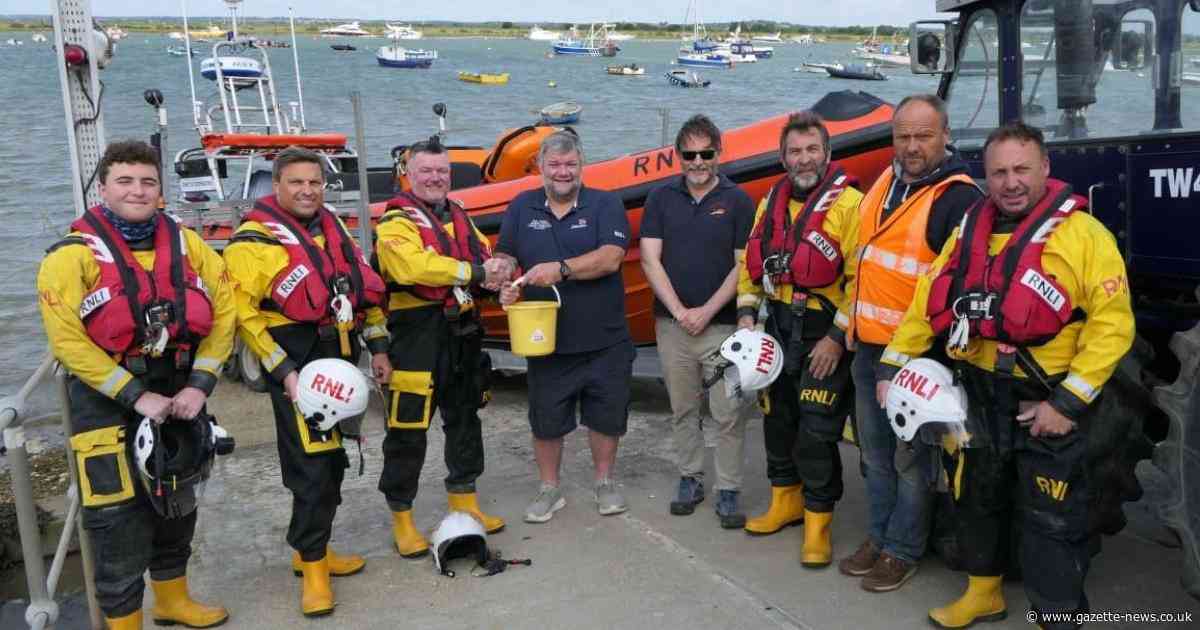 Lifeboat volunteer completes walk around Mersea Island in full kit for charity