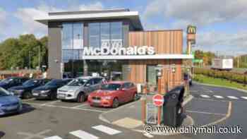 Man who crashed into McDonald's is arrested on suspicion of murder after dead woman in her 30s is later found in home