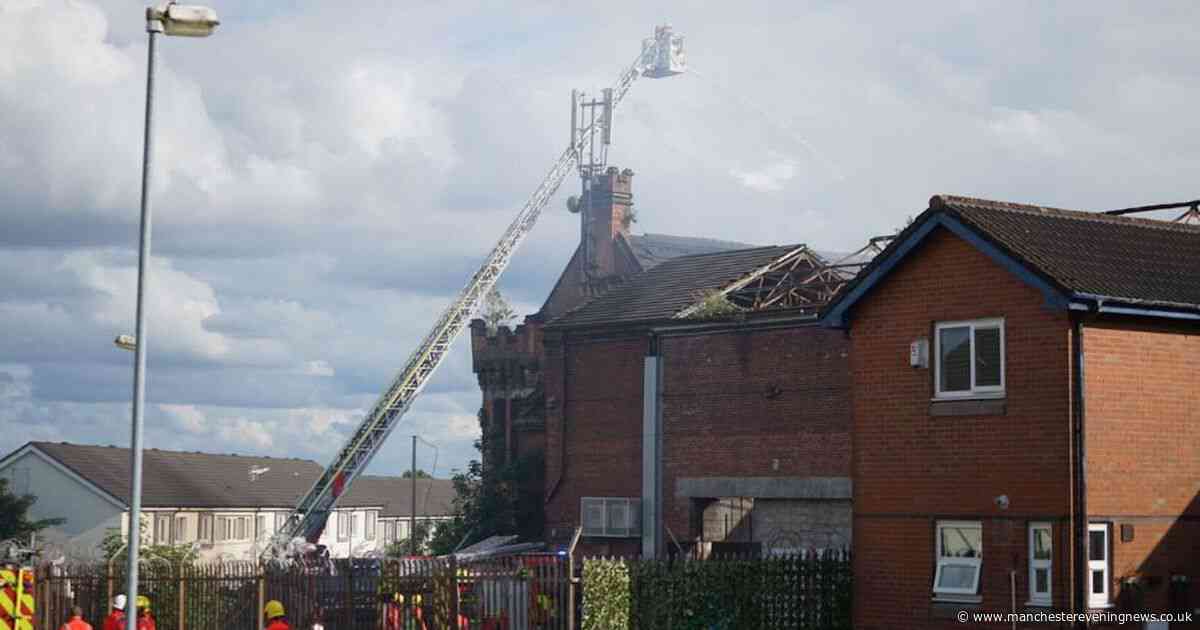 Firefighters tackle huge blaze at former drill hall near town centre